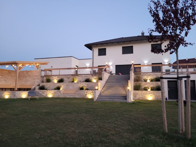 Mediterranean garden wall lit up by Loxone